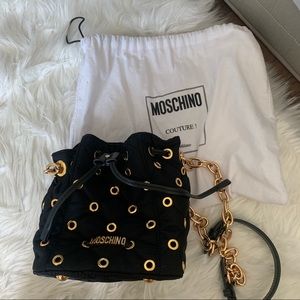 This is a Moschino bag. It is 99% new. Only used 2-3 times.